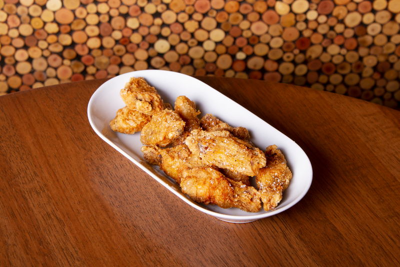 A plate of salt and pepper chicken wings